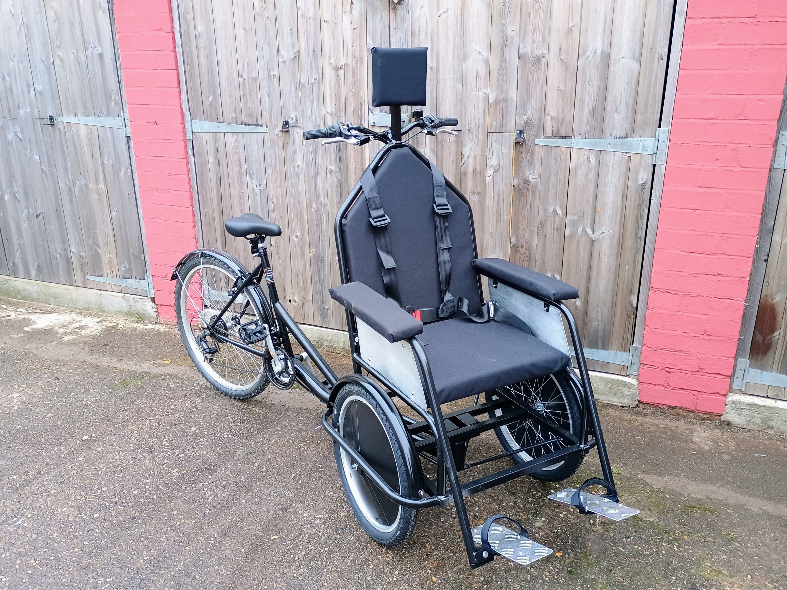 Disability bike carrying a passenger