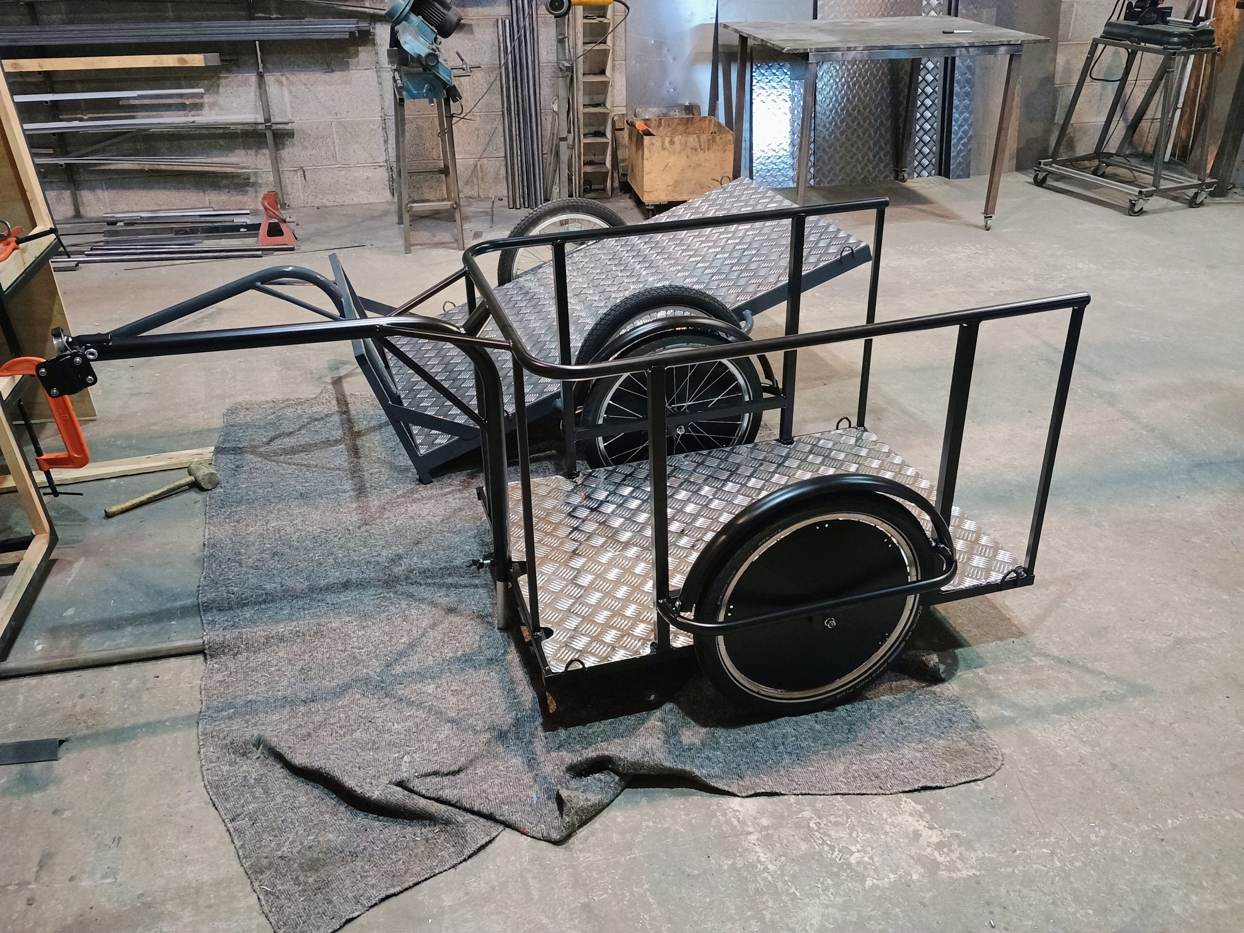 trailers for carrying a wheelchair behind a bike